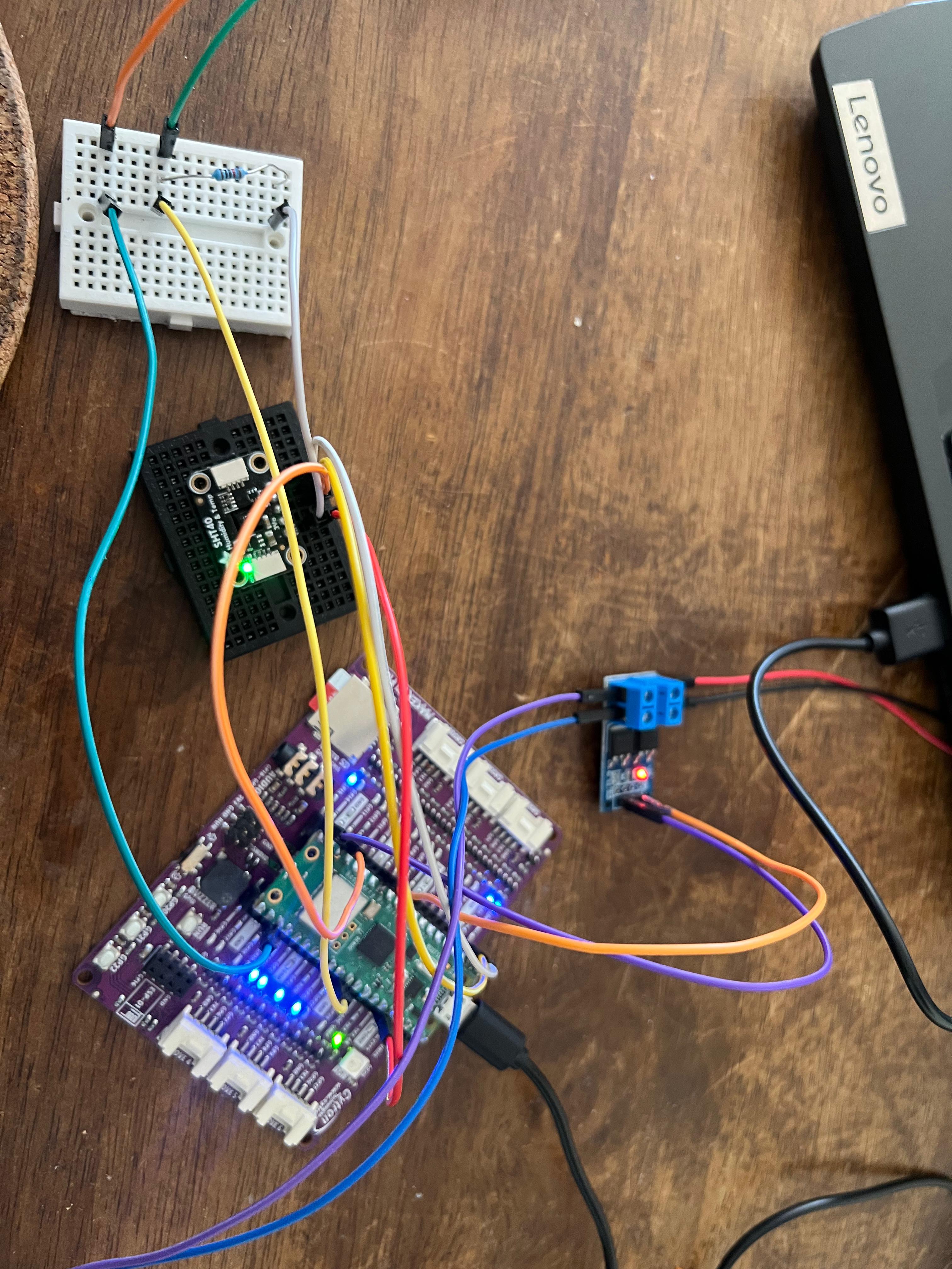 Breadboard and microcontroller project with colorful jumper wires